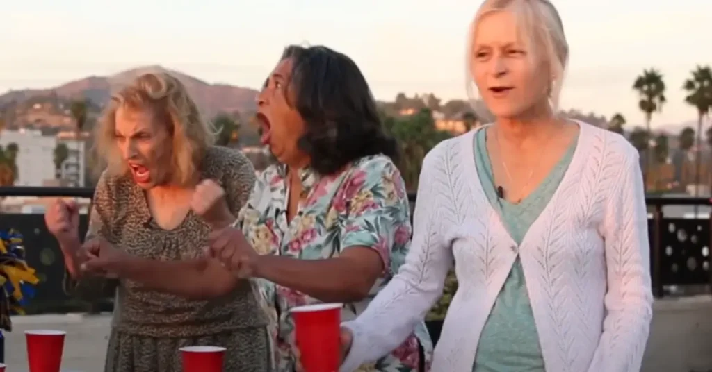 Grandmothers Playing beer pong Flip Cup